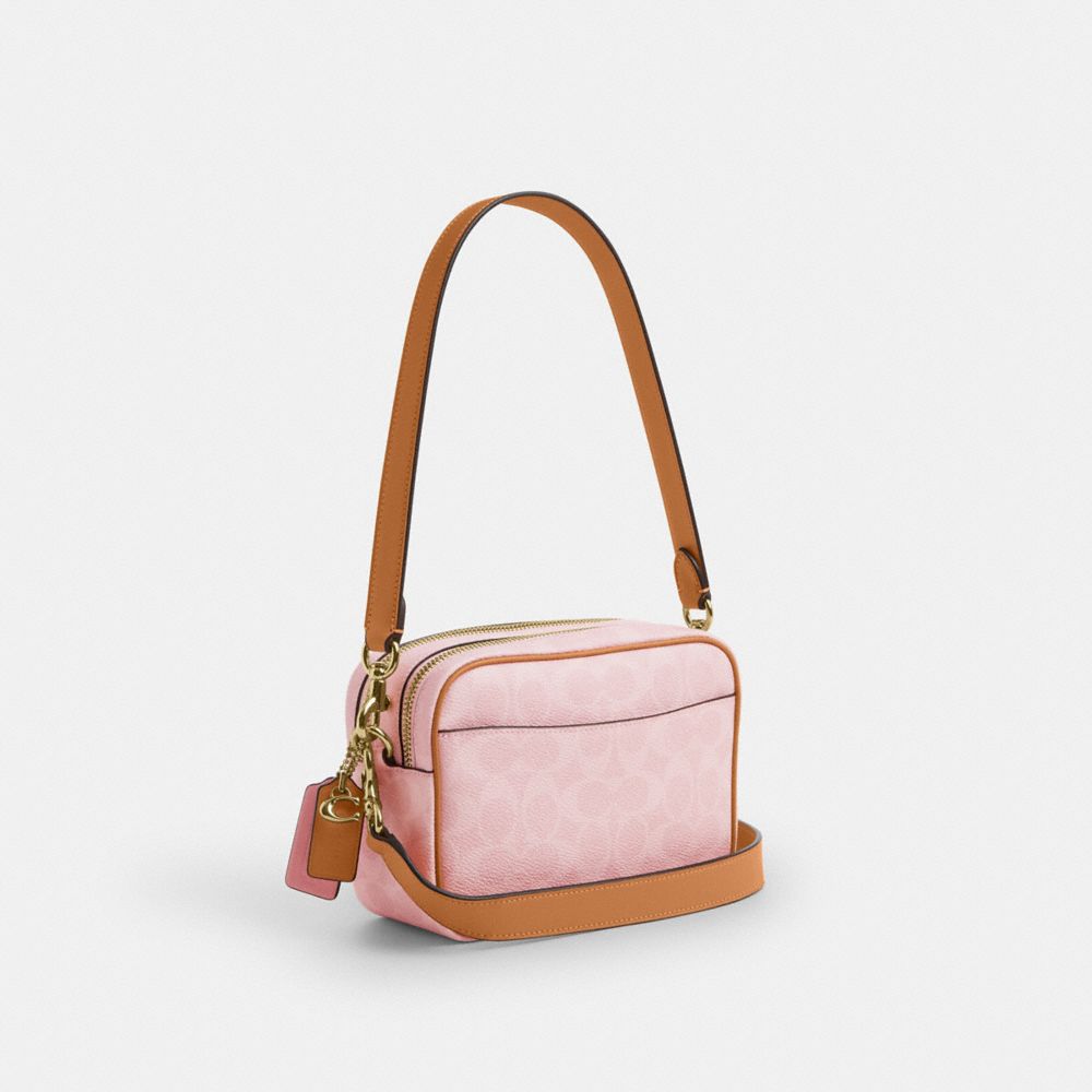 COACH®,Mini Carey Crossbody Bag In Signature Canvas With Charms,Canvas,Recycled Polyester,Leather,Camera Bag,Metal,Piping,...,Pink,Angle View
