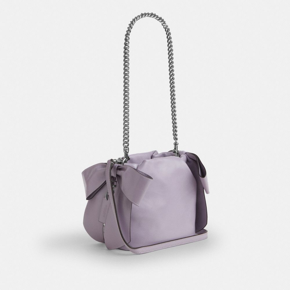 COACH®,Faye Mini Drawstring Bag With Bows,,Angle View