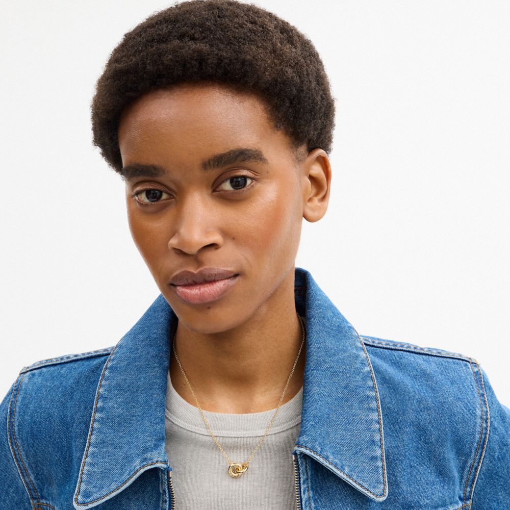 COACH®,Interlock Pendant Necklace,Single Strand,Cubic Zirconia,Logo,Interlocking Embellishment,Brass Gold,Casual,Gold,Detail View