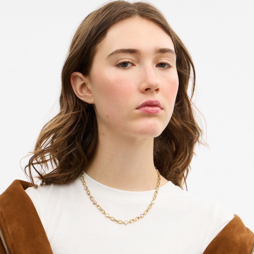 COACH®,Stars And Hearts Linked Signature Choker Necklace,Single Strand,Glass,Cubic Zirconia,Chain Link,Circle,Lettering Wo...,Yellow,Detail View