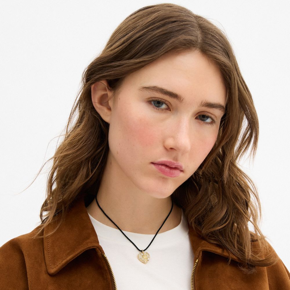 COACH®,Pavé Heart Cord Pendant Necklace,Single Strand,Cubic Zirconia,Rope,Glass,Initials Embellishment,Lettering Word,Logo...,Black,Detail View