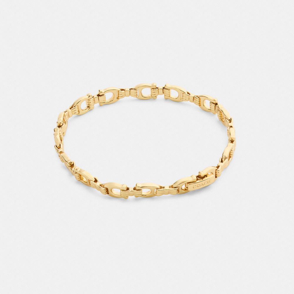 COACH®,Bow Chain Linear Bracelet,Cubic Zirconia,Bow,Lettering Word,Logo,Chain Link,Gold Metal,Casual,Clear,Front View