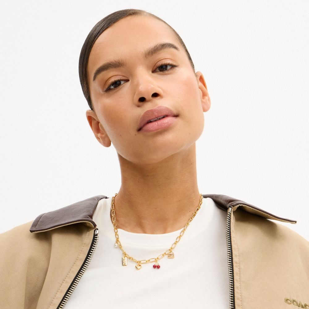 COACH®,Cherry And Heart Charm Necklace,Single Strand,Pearl,Glass,Enamel,Cubic Zirconia,3D Embellishment,Bar Embellishment,...,Red,Detail View