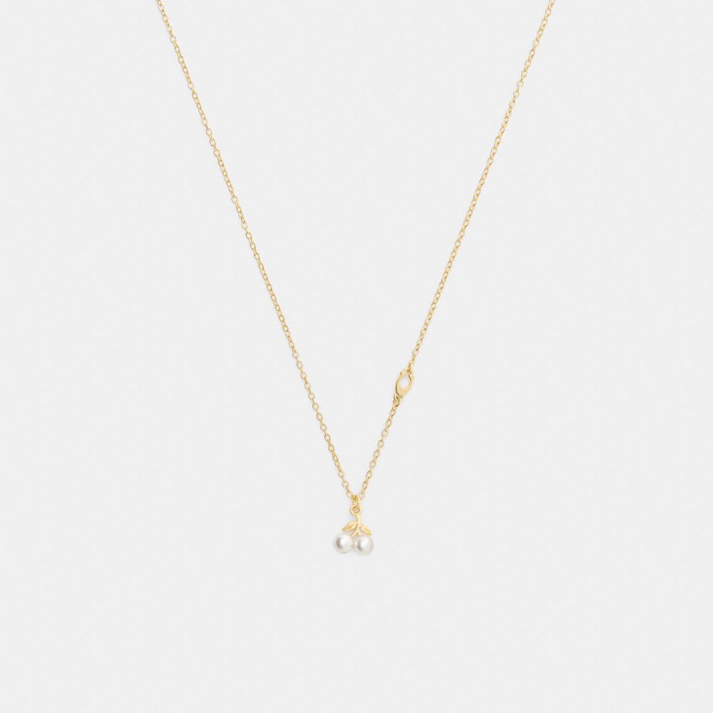 COACH®,Pearl Cherry Pendant Necklace,Single Strand,Glass,Pearl,Cubic Zirconia,3D Embellishment,Food Embellishment,Initials...,White,Front View