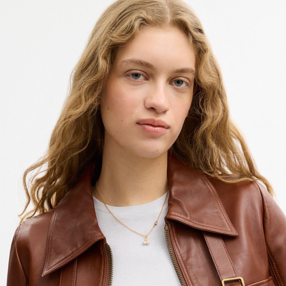 COACH®,Pearl Cherry Pendant Necklace,Single Strand,Glass,Pearl,Cubic Zirconia,3D Embellishment,Food Embellishment,Initials...,White,Detail View