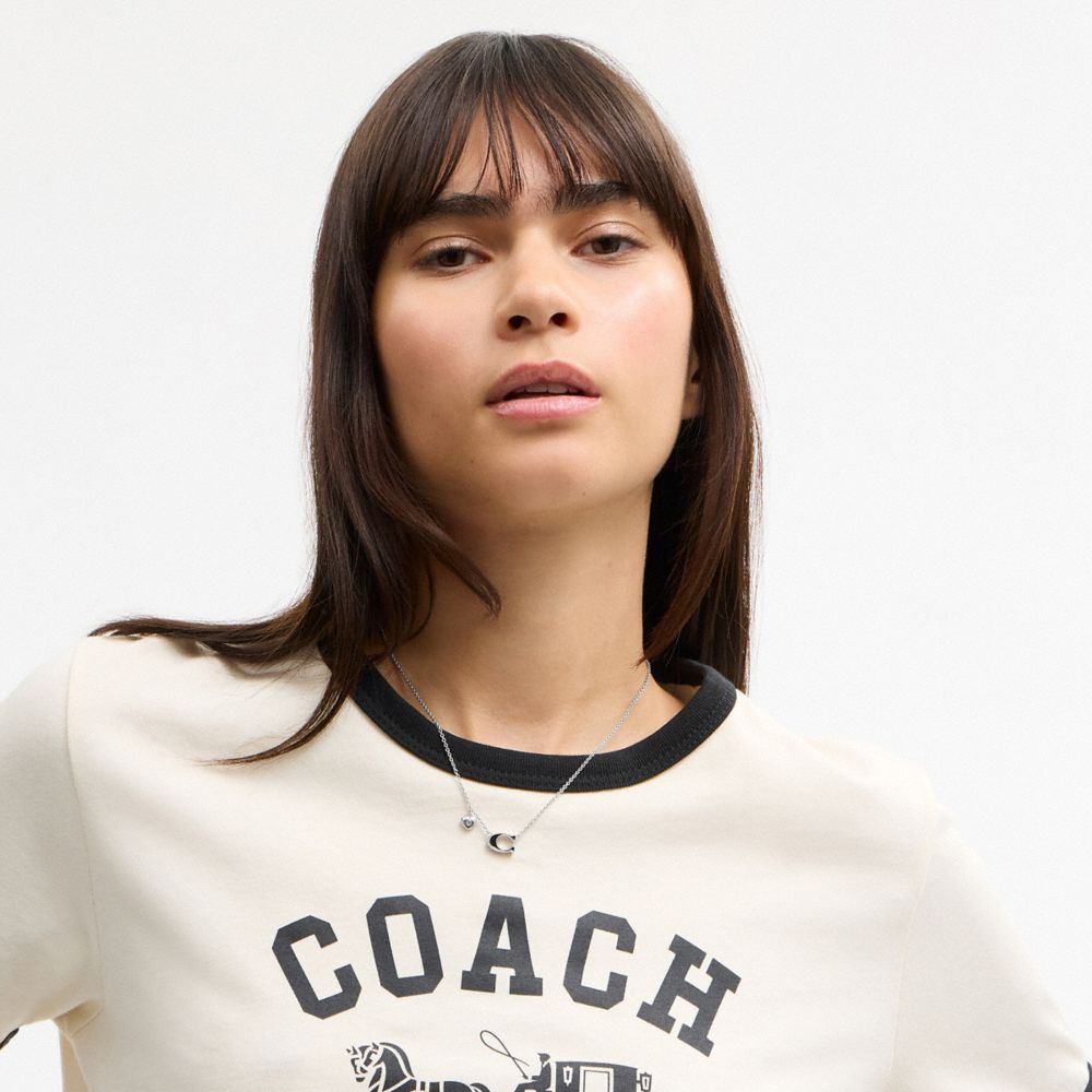 Женские брелоки Coach Enamel Signature Heart Charm Pendant Necklace — фото 3