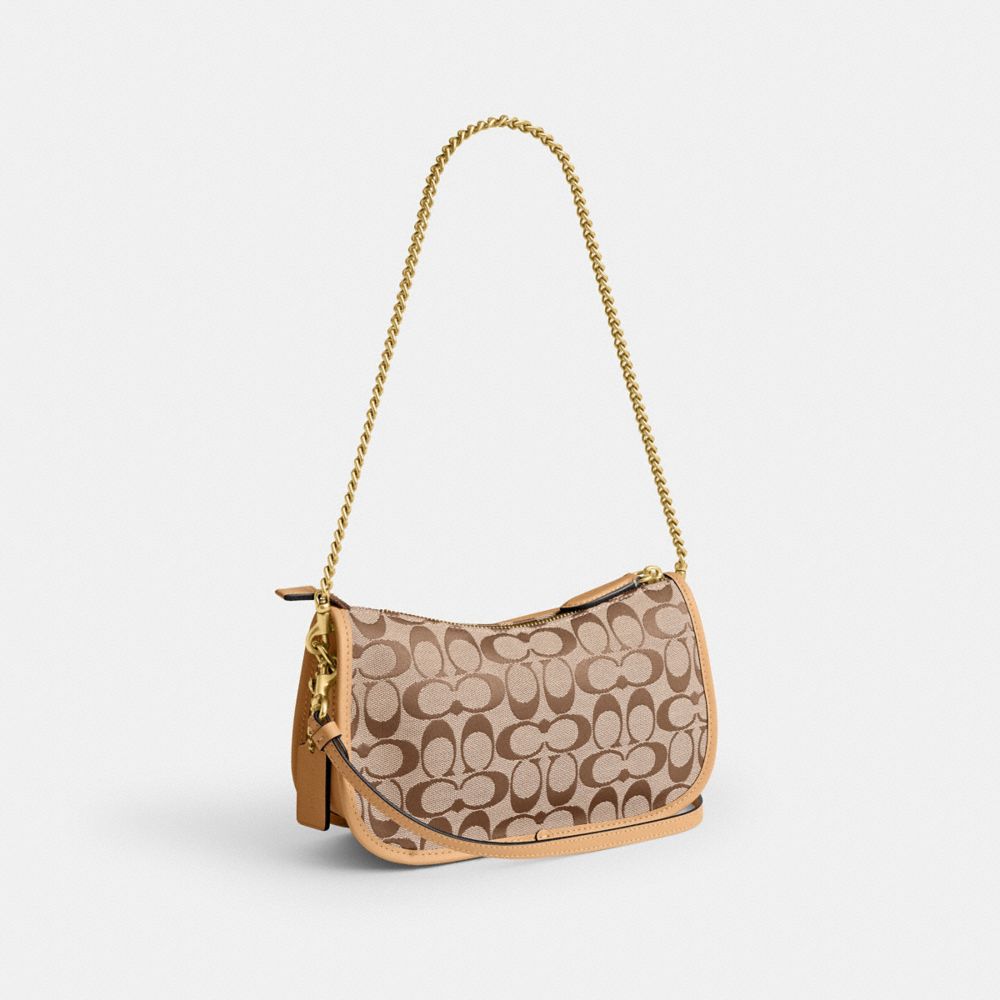 Женские сумки Coach Twin Turnlock Waverly Bag In Signature Jacquard — фото 2