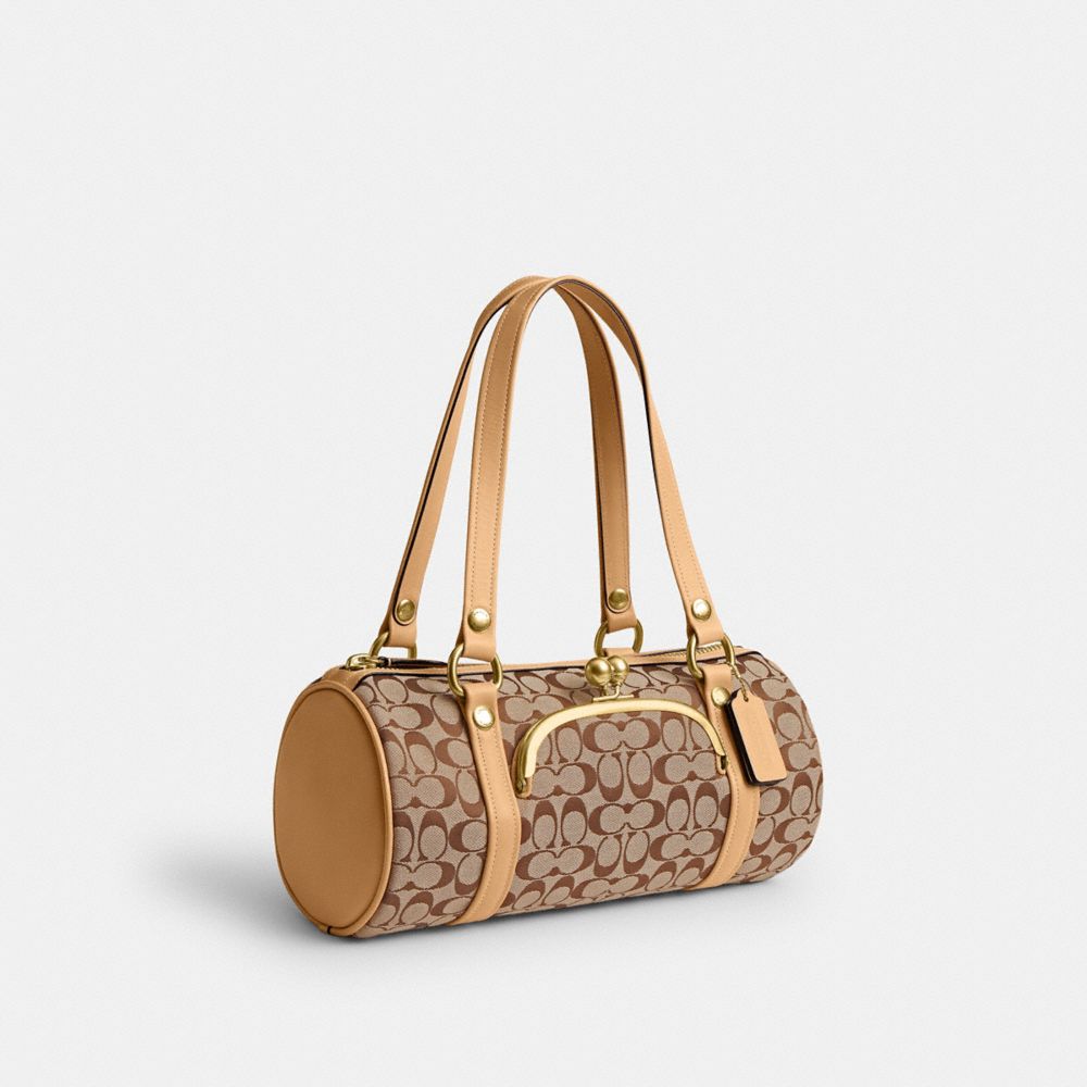 Женские сумки Coach Kisslock Barrel In Signature Jacquard — фото 2