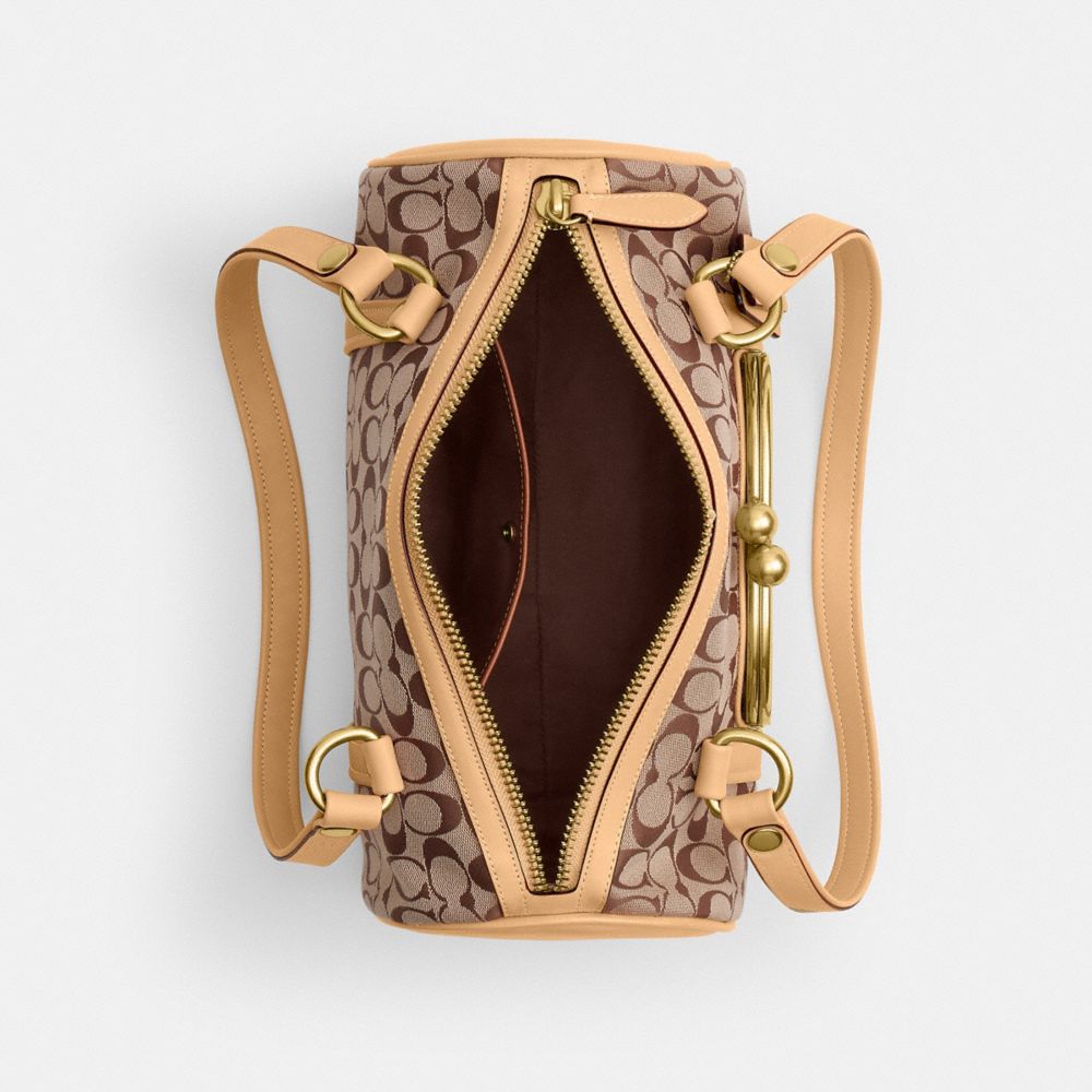 Женские сумки Coach Kisslock Barrel In Signature Jacquard — фото 4