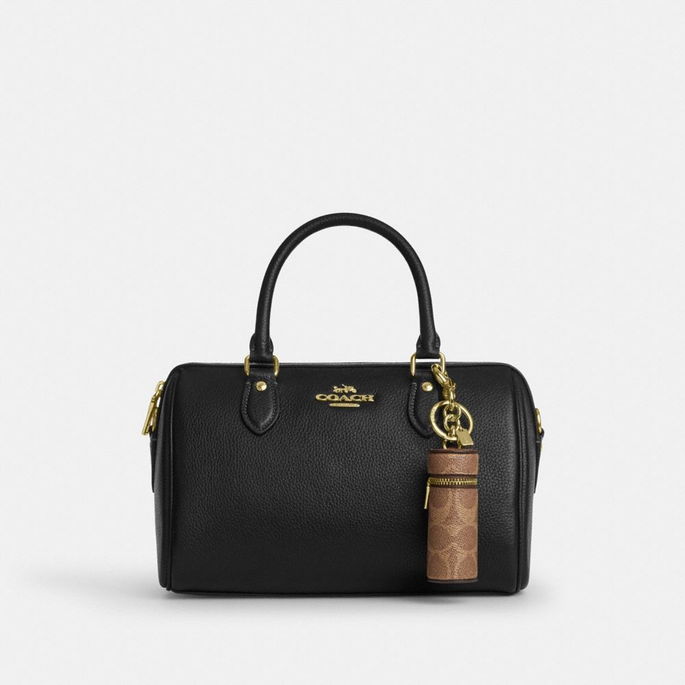 COACH®,Lipstick Case Bag Charm In Signature Canvas,,Angle View