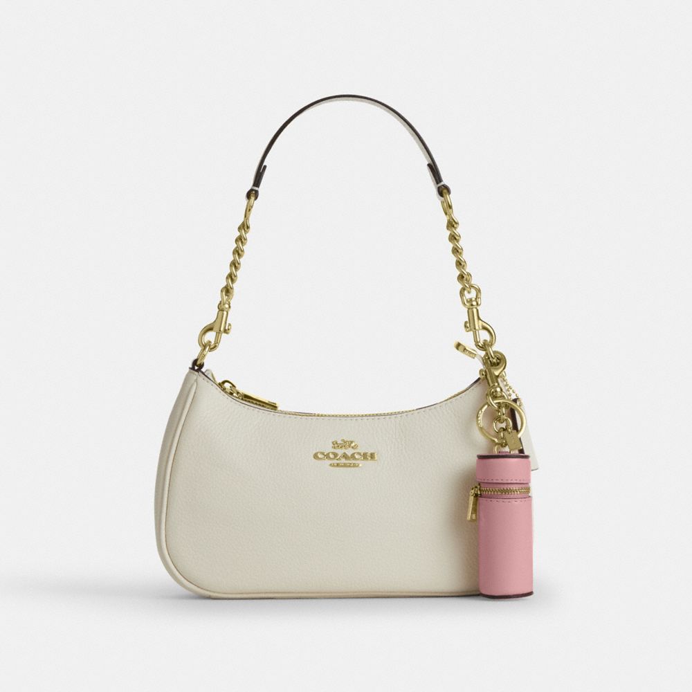 COACH®,Lipstick Case Bag Charm,,Angle View