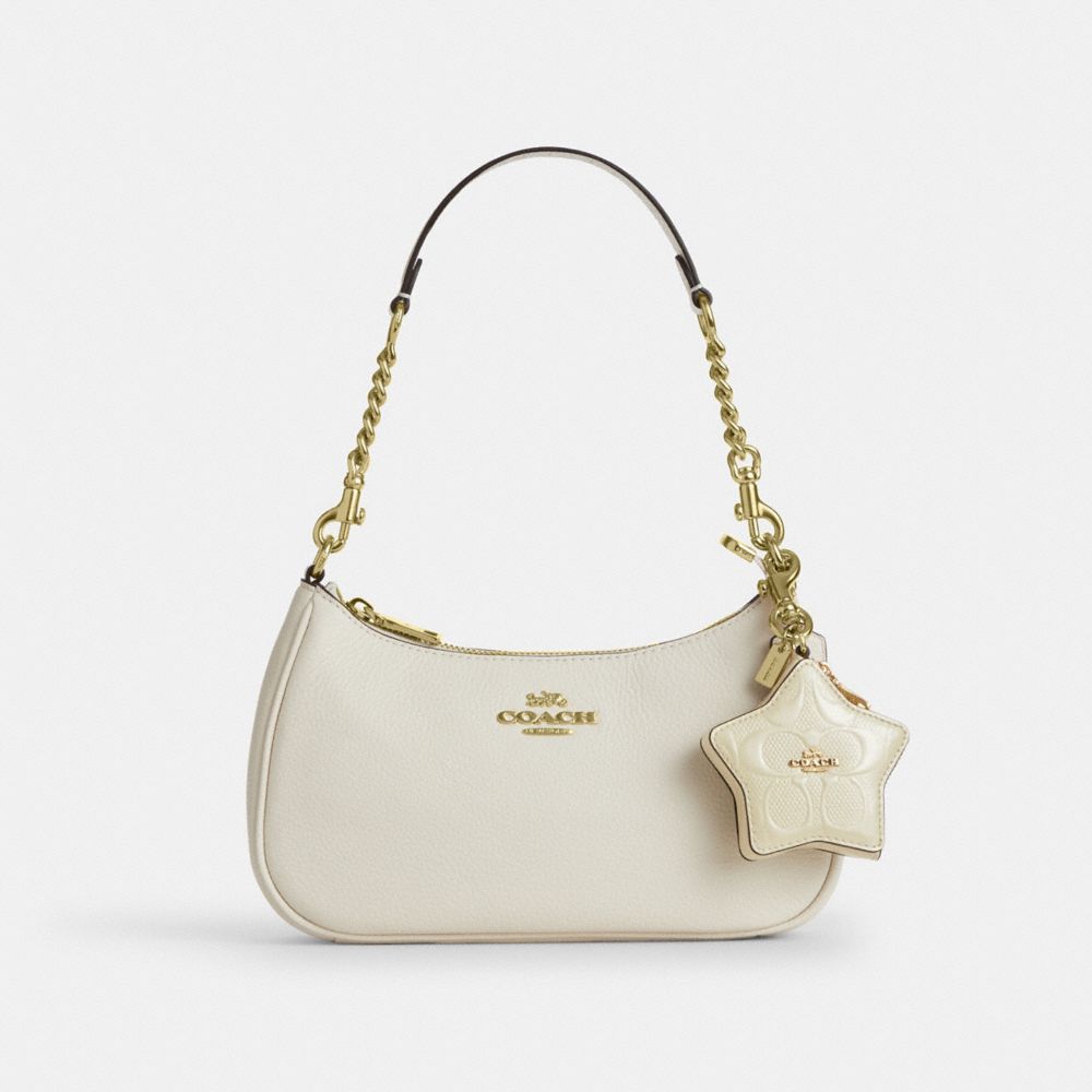 COACH®,Star Bag Charm In Signature Leather,,Angle View