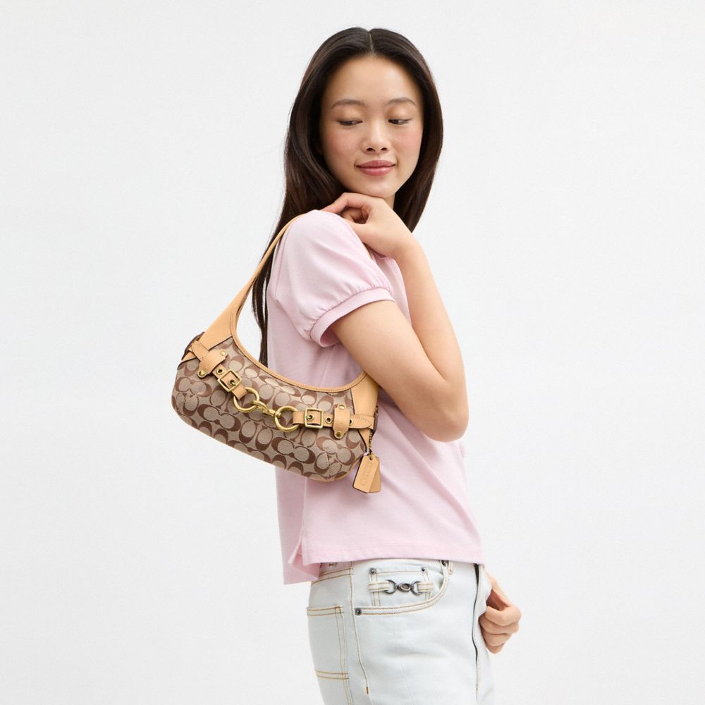 Женские сумки Coach Belted Ergo Shoulder 26 In Signature Jacquard — фото 6