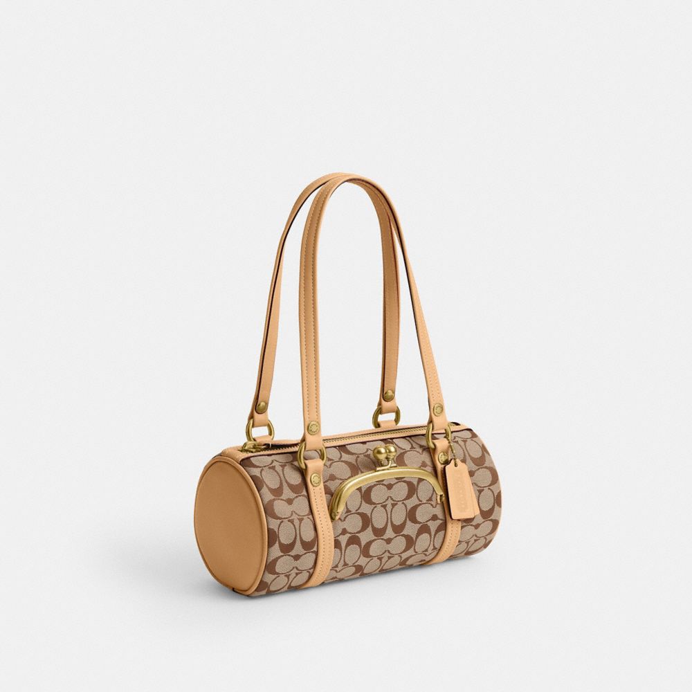 Женские сумки Coach Kisslock Barrel Bag 28 In Signature Jacquard — фото 2