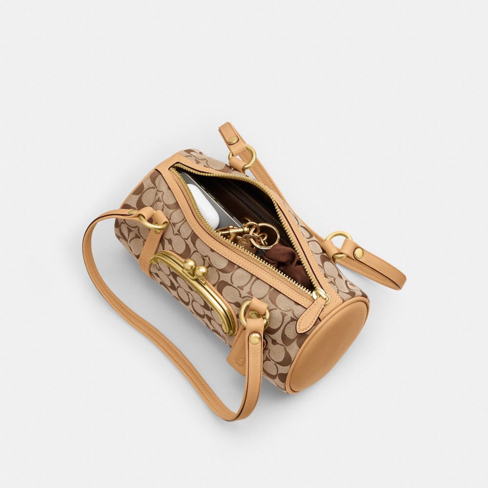 Женские сумки Coach Kisslock Barrel Bag 28 In Signature Jacquard — фото 3