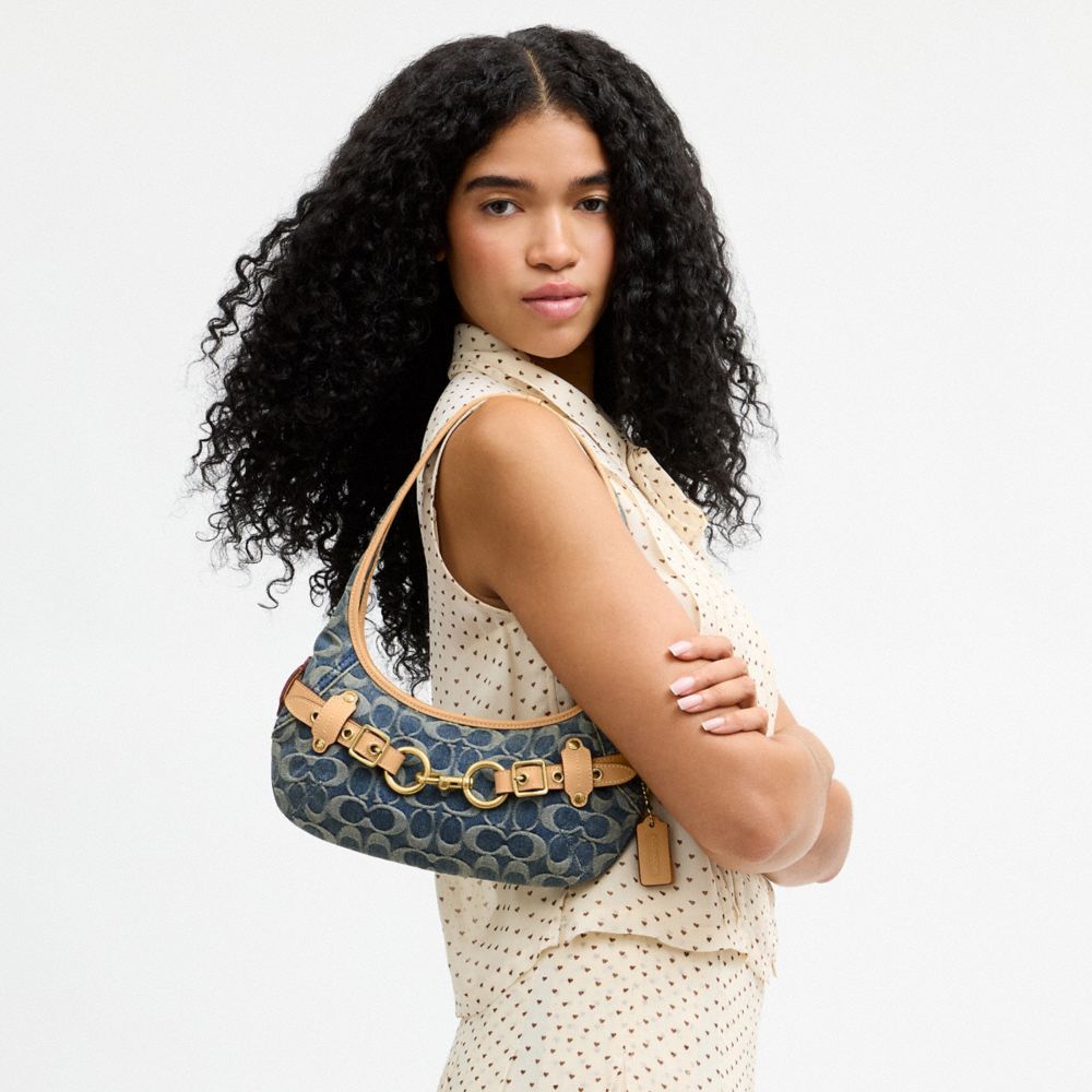 Женские сумки Coach Belted Ergo Shoulder 26 In Signature Regenerative Cotton Denim — фото 6