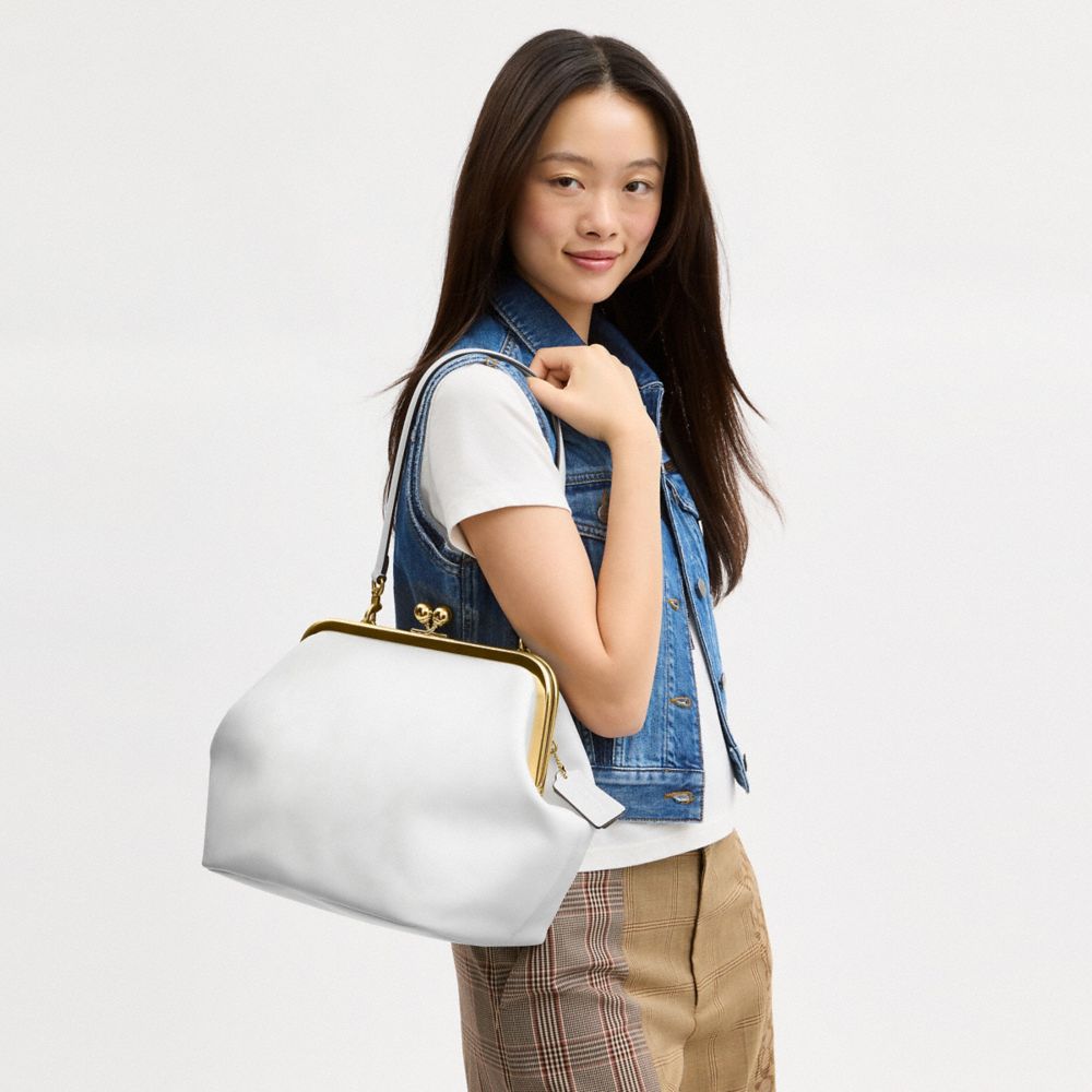 Женские сумки Coach Kisslock Frame 27 In Loved Leather — фото 6