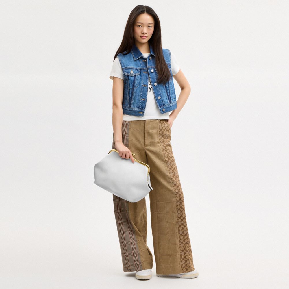 Женские сумки Coach Kisslock Frame 27 In Loved Leather — фото 7