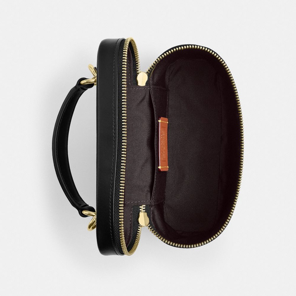 Rainer Crossbody Bag 18 Signature Canvas