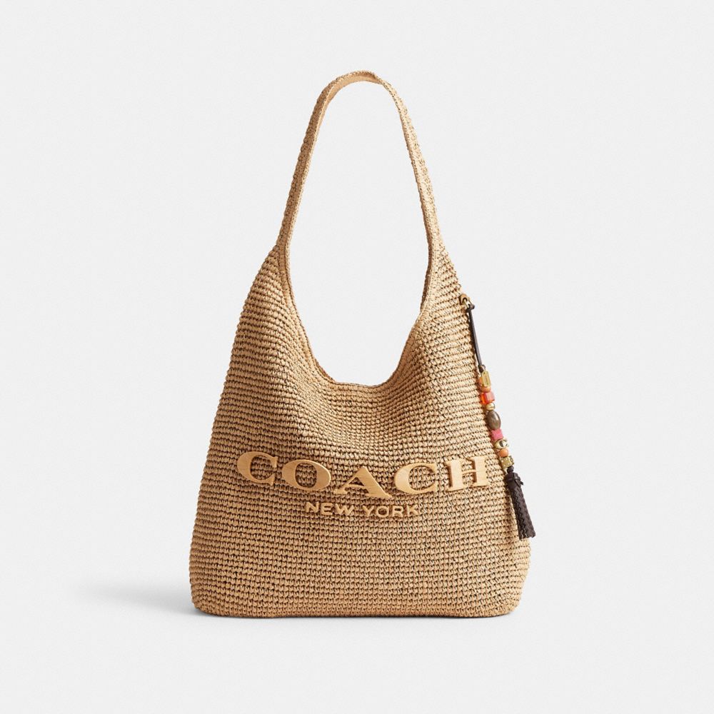 Женские брелоки Coach Beaded Tassel Bag Charm — фото 2
