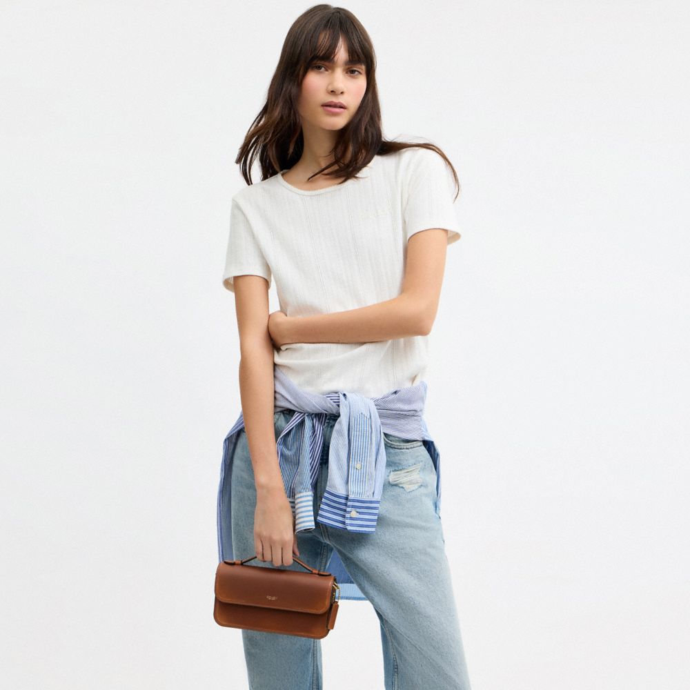 Женские сумки Coach New York Elora Top Handle Crossbody In Loved Leather — фото 8