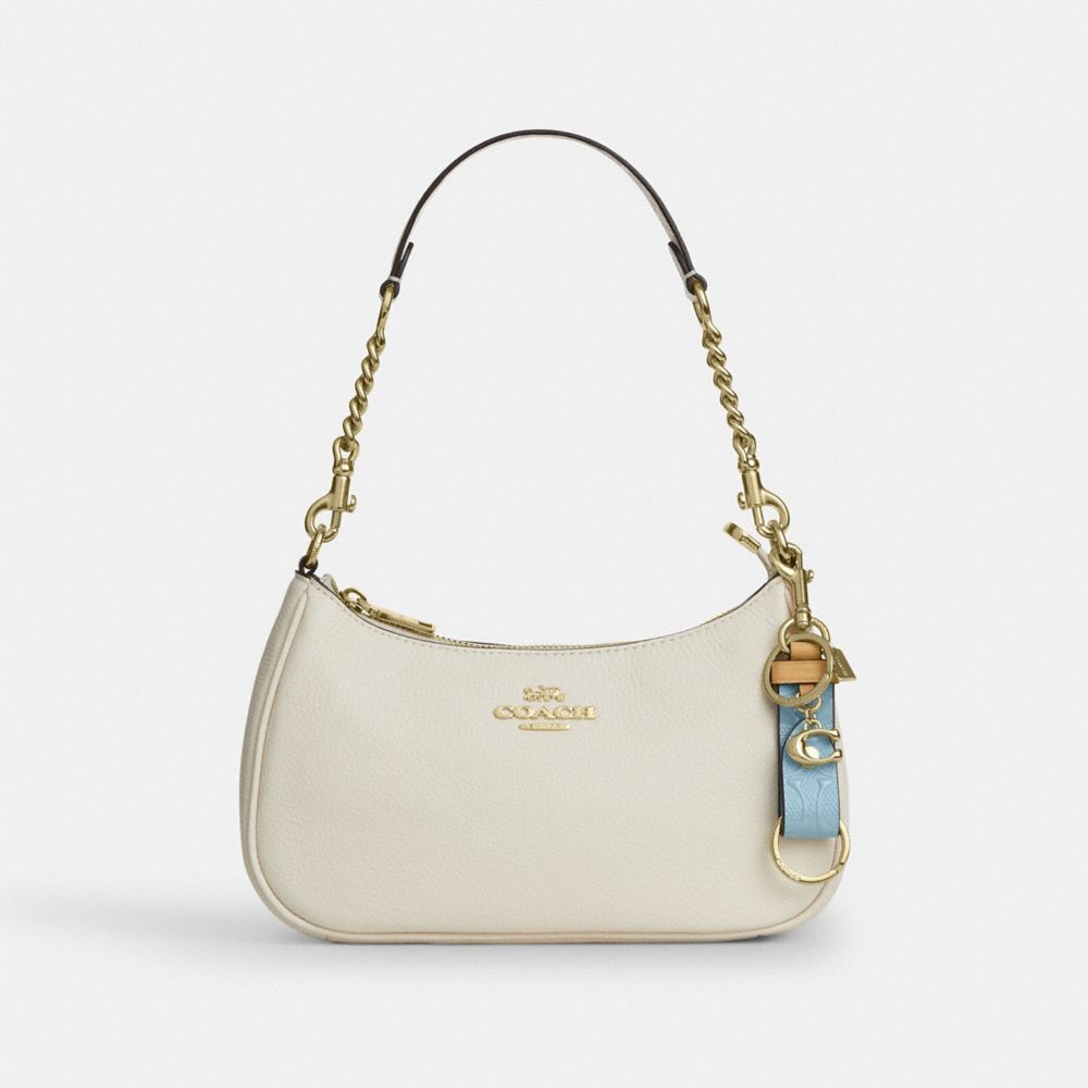COACH®,Trigger Snap Bag Charm In Signature Leather With Charm,,Angle View