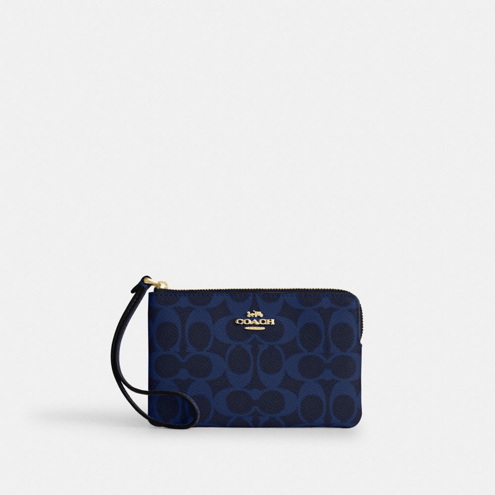 COACH®,WRISTLET À ZIP EN COIN EN TOILE SIGNATURE,Tissu en toile exclusif,Doré/bleu marine,Front View