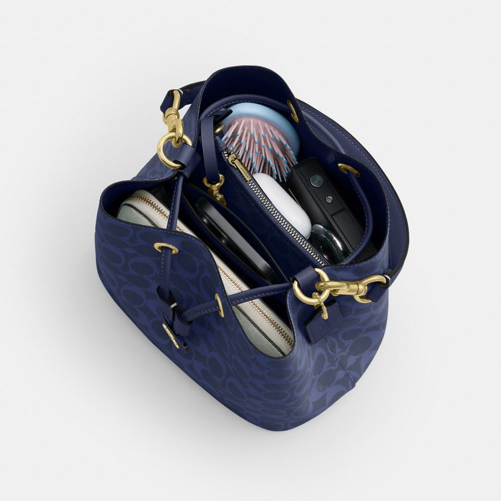 Rowan Bucket Bag In Signature Canvas