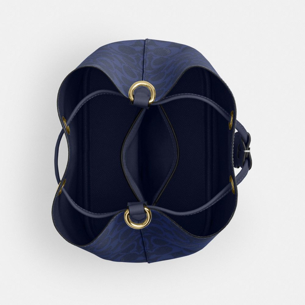 Rowan Bucket Bag In Signature Canvas