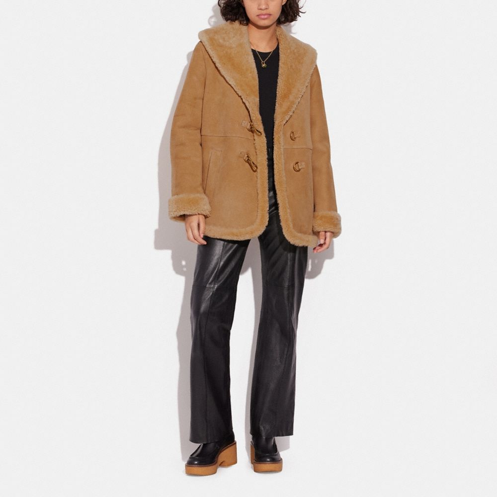 Shearling shop jacket coach