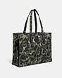 COACH®,100 PERCENT RECYCLED CANVAS TOTE 42 WITH CAMO PRINT AND REXY,Recycled Canvas,X-Large,Rexy,Green Camo,Angle View