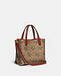 COACH®,WILLOW TOTE 24 IN SIGNATURE CANVAS WITH REXY PRINT,Signature Coated Canvas,Medium,Brass/Khaki/Rust,Angle View