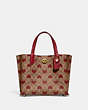 COACH®,WILLOW TOTE 24 IN SIGNATURE CANVAS WITH HEART PRINT,Signature Coated Canvas,Medium,Brass/Tan Red Apple,Front View