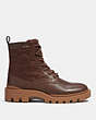 COACH®,CITYSOLE LACE UP BOOT WITH SHEARLING AND RECYCLED POLYESTER,Leather,Bison Brown,Angle View