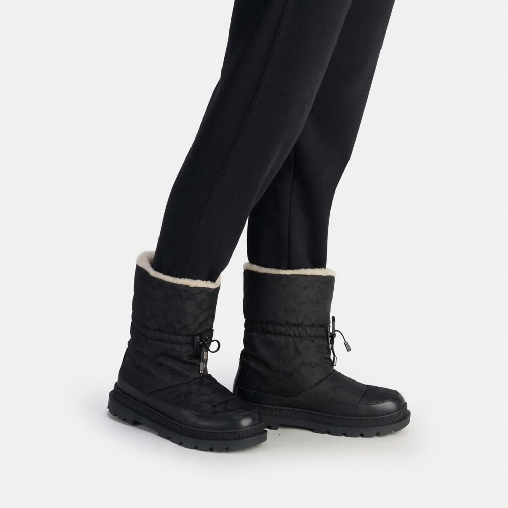 COACH®,BOTTE DE SKI EN POLYESTER RECYCLÉ,Polyester,Noir,Detail View