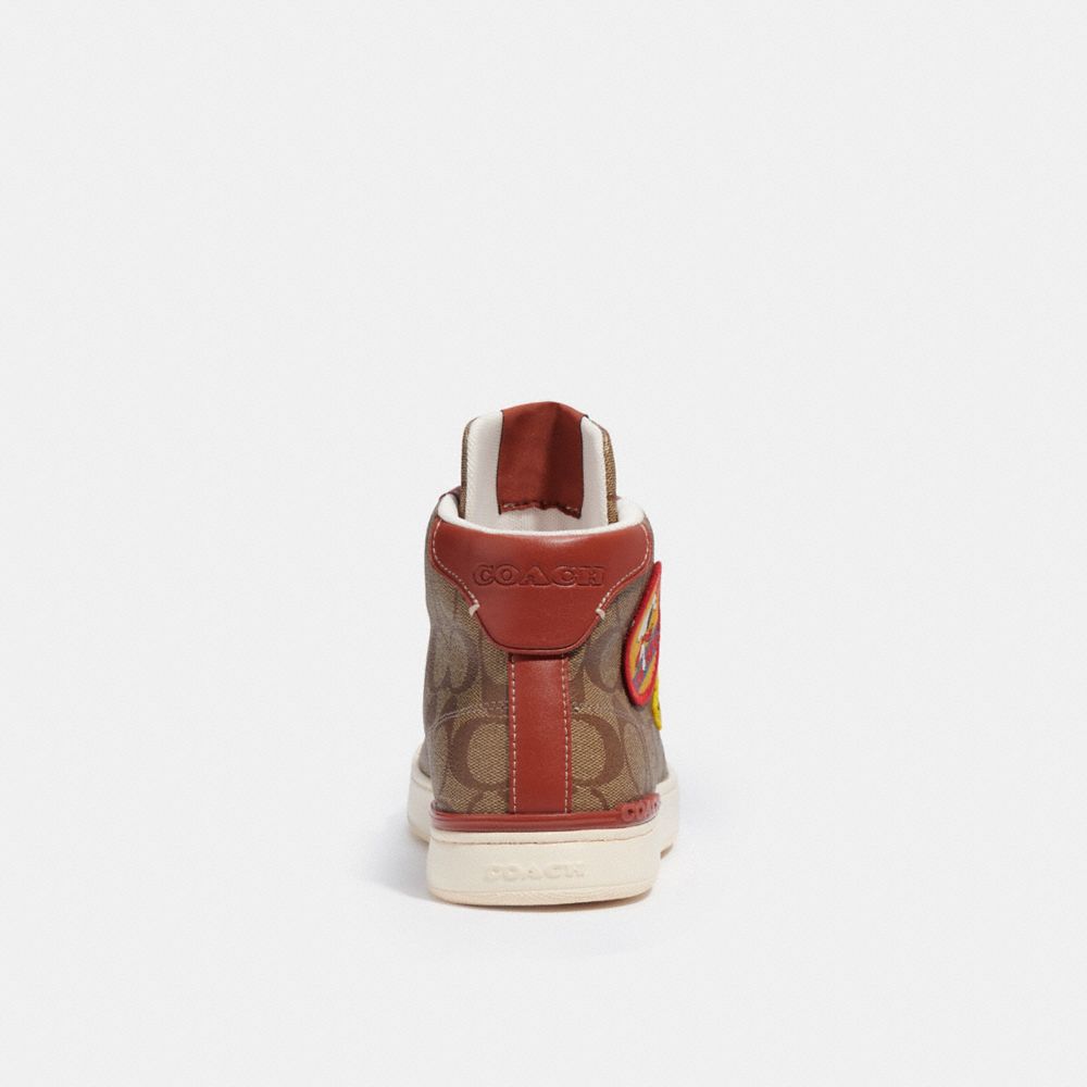 COACH® | Coach X Peanuts Clip High Top Sneaker In Signature Canvas