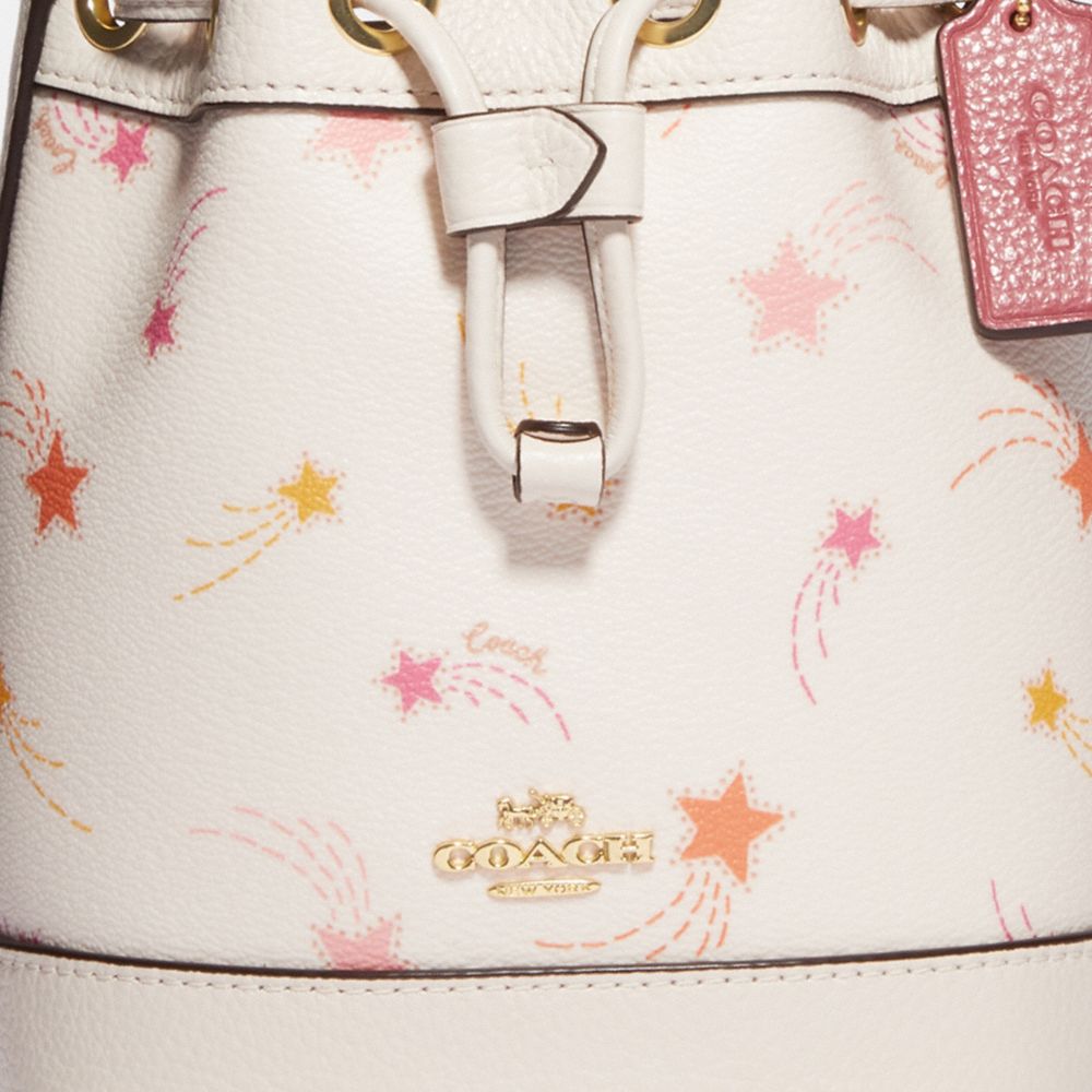 COACH®  Dempsey Drawstring Bucket Bag 15 In Signature Canvas With Star And  Snowflake Print