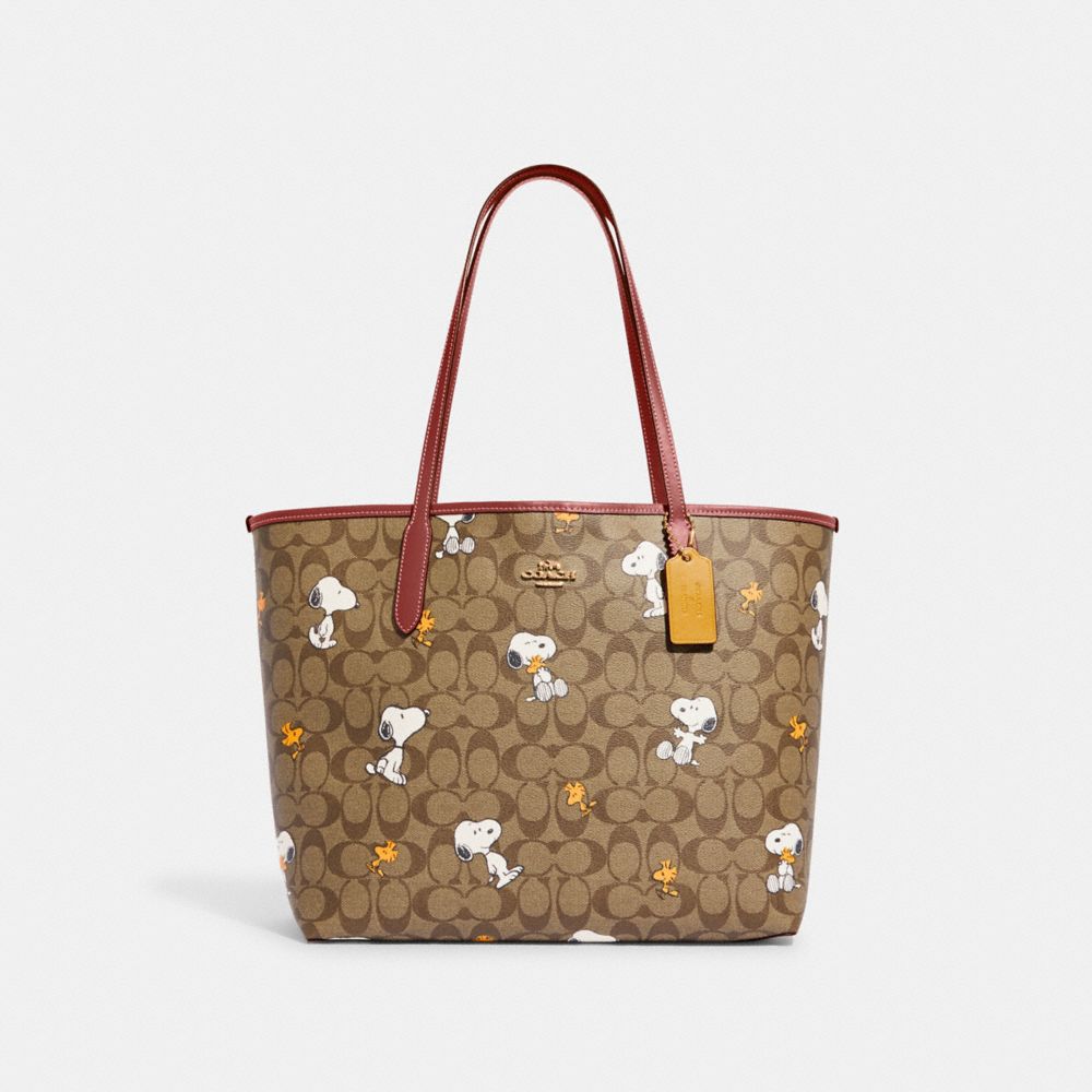 COACH®  Coach X Peanuts City Tote In Signature Canvas With Snoopy  Woodstock Print