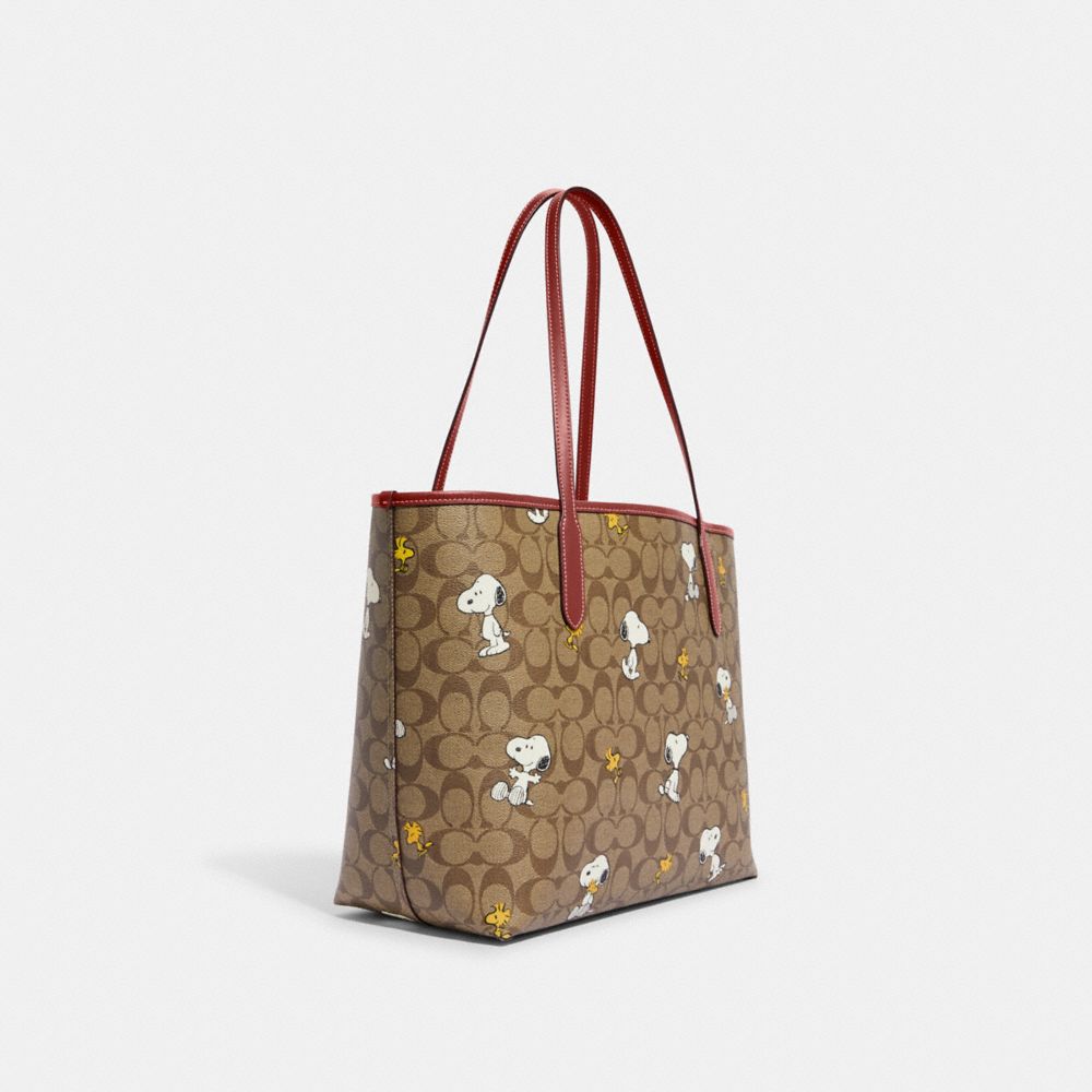 COACH® | Coach X Peanuts City Tote In Signature Canvas With