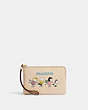 COACH®,COACH X PEANUTS CORNER ZIP WRISTLET WITH SNOOPY AND FRIENDS MOTIF,Refined Pebble Leather,Mini,Gold/Ivory Multi,Front View