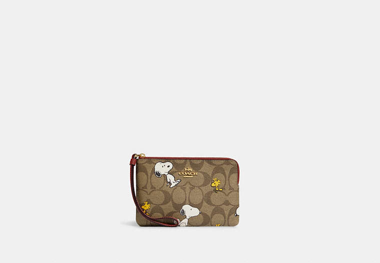 COACH®,COACH X PEANUTS CORNER ZIP WRISTLET IN SIGNATURE CANVAS WITH SNOOPY WOODSTOCK PRINT,Signature Coated Canv...,Gold/Khaki/Redwood Multi,Front View