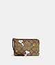 COACH®,COACH X PEANUTS CORNER ZIP WRISTLET IN SIGNATURE CANVAS WITH SNOOPY WOODSTOCK PRINT,Signature Coated Canv...,Gold/Khaki/Redwood Multi,Front View