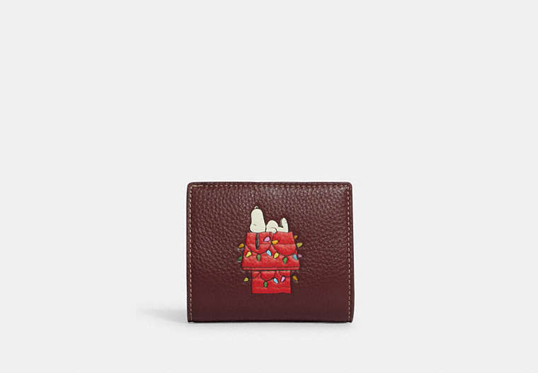 COACH®,COACH X PEANUTS SNAP WALLET WITH SNOOPY LIGHTS MOTIF,Refined Pebble Leather,Mini,Gold/Wine Multi,Front View