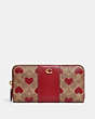 COACH®,ACCORDION ZIP WALLET IN COLORBLOCK SIGNATURE CANVAS WITH HEART PRINT,canvas,Mini,Brass/Tan Red Apple,Front View