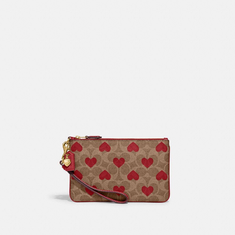 COACH® | Small Wristlet In Signature Canvas With Heart Print