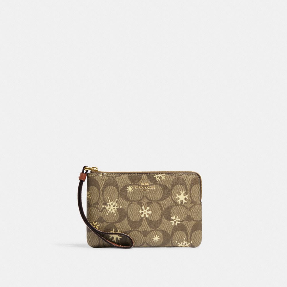 Corner Zip Wristlet In Signature Canvas With Snowflake Print