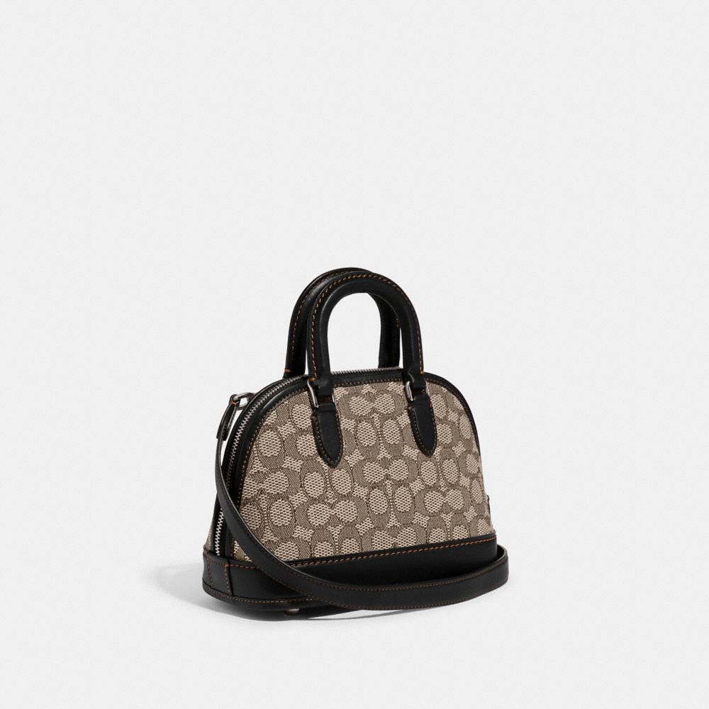 COACH®,REVEL BAG 24 IN SIGNATURE TEXTILE JACQUARD,Signature Jacquard,Medium,Silver/Cocoa Black,Angle View