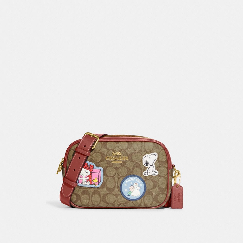 COACH® | Coach X Peanuts Jamie Camera Bag In Signature Canvas With Patches