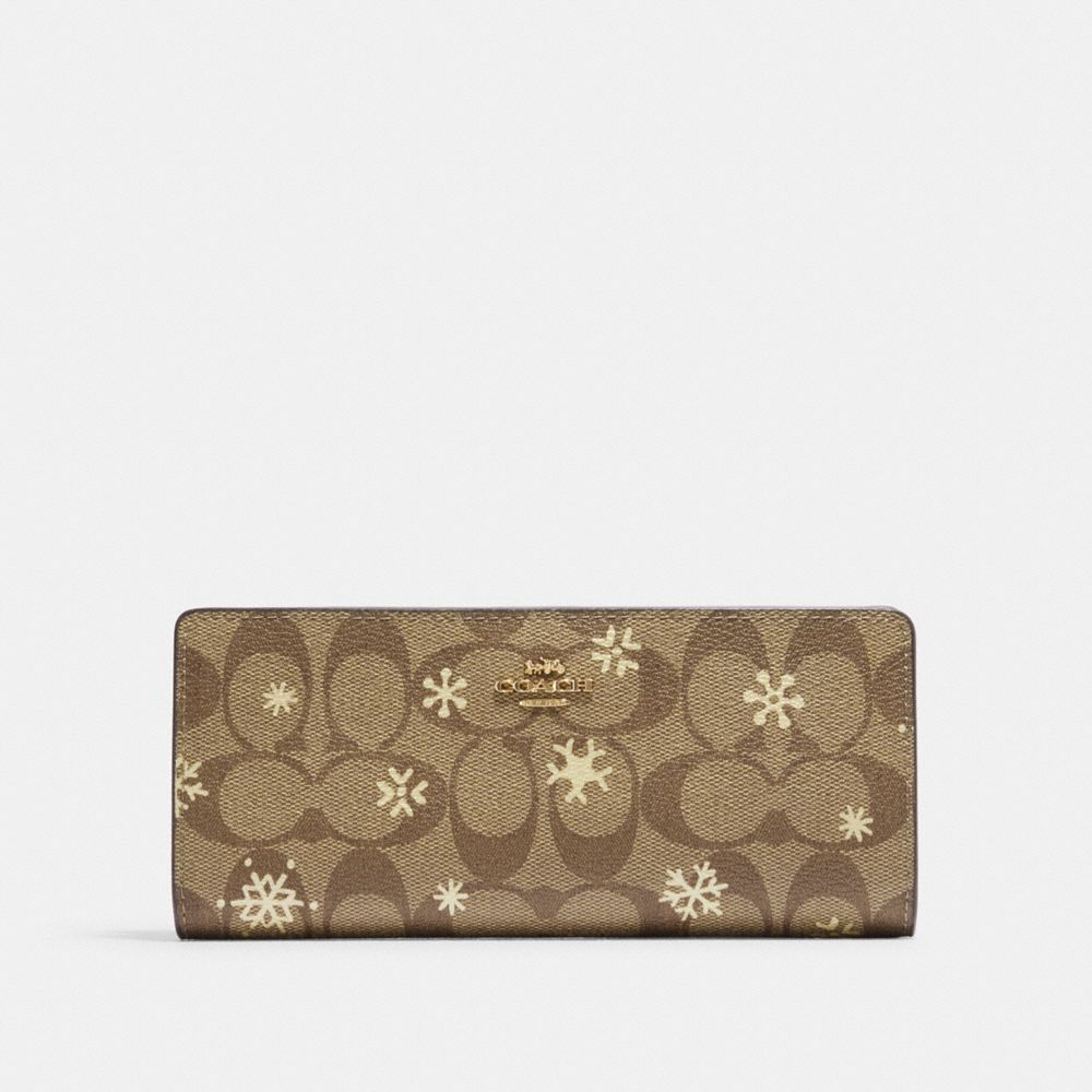COACH®,SLIM WALLET IN SIGNATURE CANVAS WITH SNOWFLAKE PRINT,Mini,Im/Khaki/Gold Multi,Front View