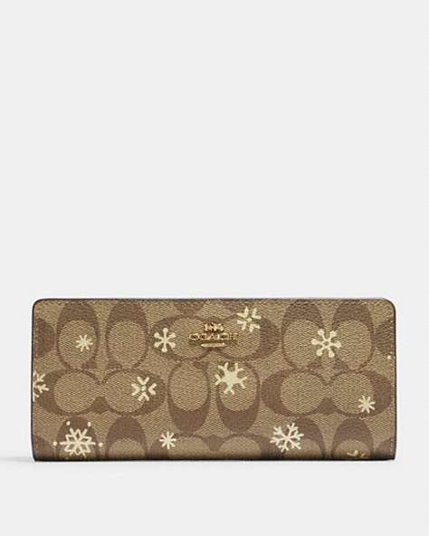 COACH®,SLIM WALLET IN SIGNATURE CANVAS WITH SNOWFLAKE PRINT,Signature Coated Canvas,Mini,Im/Khaki/Gold Multi,Front View